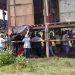 Prajurit Pamtas Yonif 413 Kostrad Bantu Warga Pindahkan Rumah
