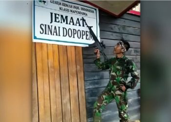 Begini Reaksi Kodam Cenderawasih Usai Beredar Foto Prajurit TNI Pegang Senjata di Depan Gereja di Papua